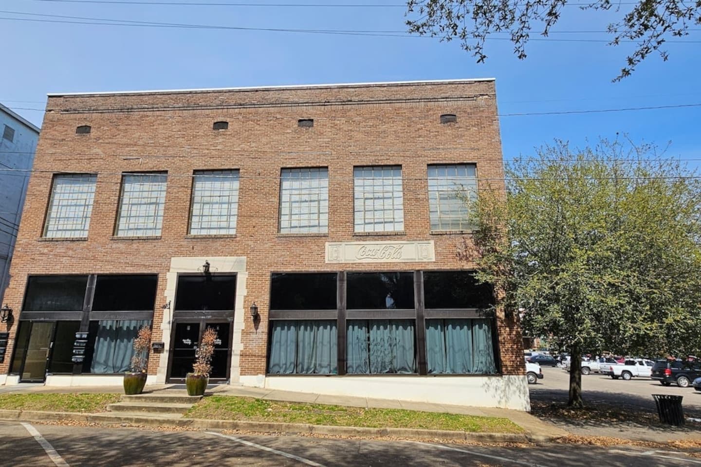 Historic Coca-Cola Loft Near Columbus AFB – Modern 1BR Retreat in Downtown